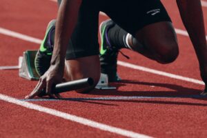 Leichtathlet mit Staffelstab