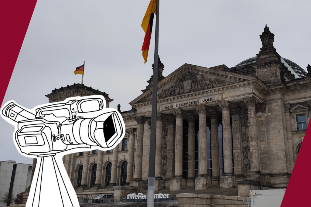 Eine Kamera steht vor dem deutschen Bundestag